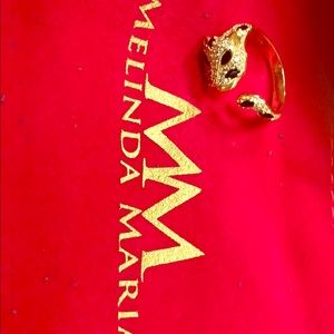 Gold and black jaguar ring